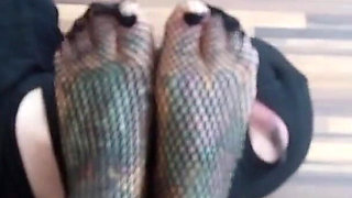 Blonde tattooed lady and her foot slave