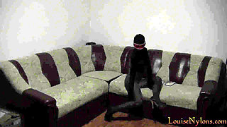 Louise, into a sexy black encasement with slutty high heels