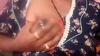 Aunty milking her boobs