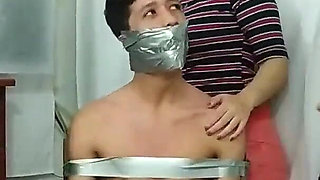 Chair Bound and Tickled by Three Microfoamly Tape Gagged Girls!