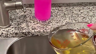 Peeing Into a Measuring Cup in the Kitchen, Making a Mess as Always
