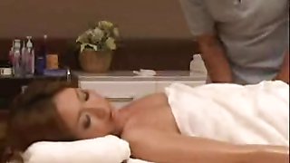 Tan Japan milf oiled up and fingered on massage bed