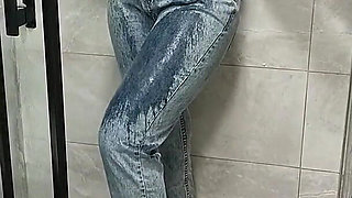 Sexy Show Getting Wet in the Shower in Clothes