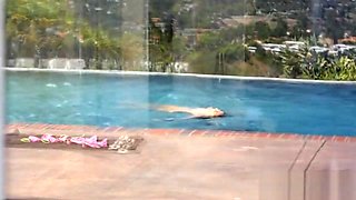 Marica Hase takes a BBC by the pool