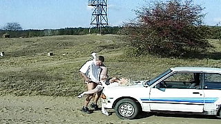 A big boobed blonde French bride takes dick in the ass in the car
