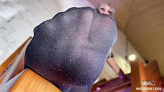 My odor feet in black stockings tease above you face on the ladder
