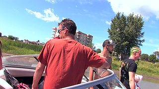 Six People on a Boat in Open Water Getting Wild