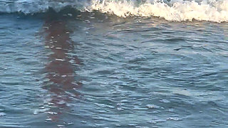 Try Not to Wet My Hair While Play with the Waves