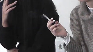 Olga and Natasa Smoking