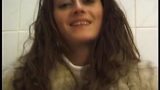 Stunning brunette babe seducing her pussy with vibrator in the bathroom