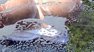 Blonde is flashing her big boobs in the outdoors