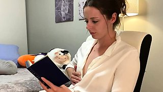 Voyeur of sexy brunette reading a hot romance novel and