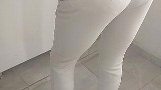 Turkish woman in white tights, thin stockings, hijab