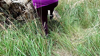 Slapping and whipping her pussy red in the woods