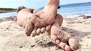 Sexy leggy brunette enjoys foot fetish