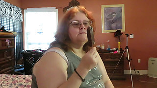 BBW redhead Mature Nurse vicki  licks and sucks on an ice cream