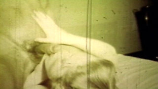 Worn Sepia Loop Captures Curly Retro Couple in Raw Bedroom Passion