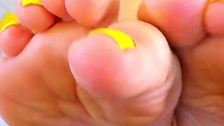 Beauty Alice Shows Her Feet Close-up