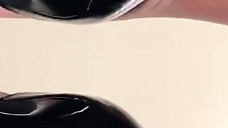 Dangling Black Heels Tease