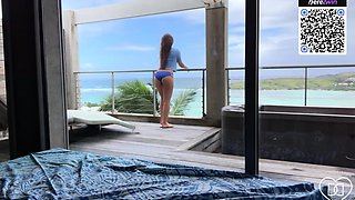 A woman likes a beach look while masturbating