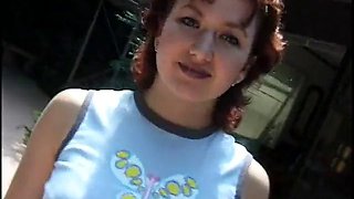 Redhead MILF with small tits rides a hard cock by the pool