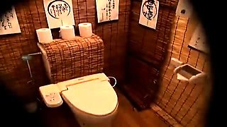 Pretty Japanese babe takes a cock for a ride in the toilet