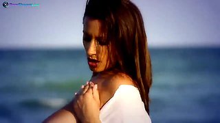 Big Tits brunette Sensual Jane masturbating at the beach