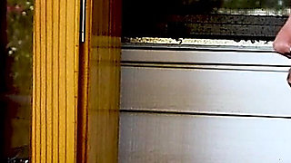 Shaved Head Goth Smokes Outside