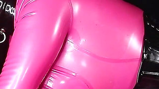 Cristal Kinky Rubber Doll Getting Used by 2 Condom Covered Cocks