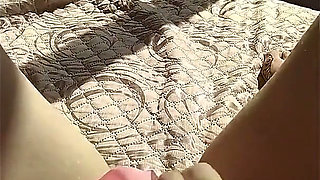 Russian Unshaven Pussy Sunbathes in the Sun and Touches Her Clitoris with Her Finger Ginnagg