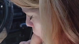 Pretty teen gives a hot POV blowjob in the car!