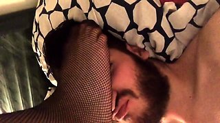 Dominating lady in nylons has a guy enjoying her lovely feet