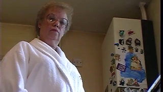 British granny strips in her kitchen