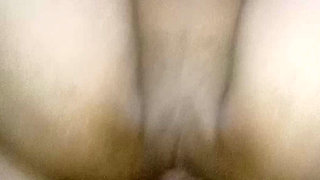 Sitting next to her husband while she was in the shower.